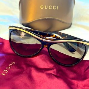Gucci Cateye sunglasses. Tortoise with Gold detailing. Case and bag included.